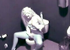 Hot Blonde Babe sitting on toilet until she get horny. she Masturbate hard while licking her finger until it orgasm