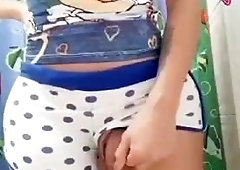 Shemale drops shorts for a pee