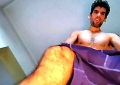 Hairy hunk shaking his ass and teasing his puckered hole while jerking off