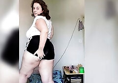 playing with my bazookas by the window