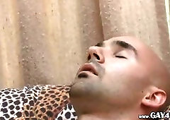 Bald guy jerking off his dick