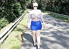 I went for a bit of a cocky walk, and on a bridge, I positioned myself so that passing drivers had a nice view of my breasts.