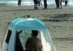 Beach voyeur films husband and wife having sex in a tent