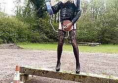 Crossdressing t-girl outdoors milk enema and squirting from her booty
