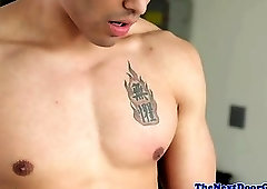 Muscular stud gently tugging his cock