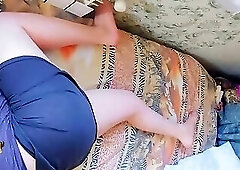 Playful trans girl showing thigh tattoo in short skirt