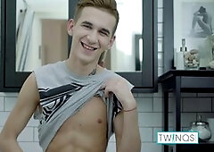 Skinny blond guy William is soaping up his huge cock in the shower