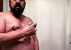 Watch me enjoying my nipple clamps as I jerk myself off.