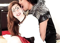 A gal clothed as a peasant new from a medieval party needs to charge her phone, but there're no nearby outlets, so this babe has to go to the qua