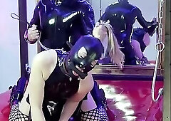 Latex slut used and dominated with ball gag chains and anal hook butt plug