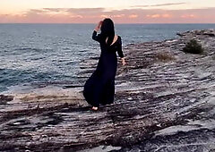 Sea Waves, Cliff and the Slut Young Woman