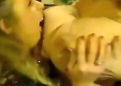 Tiffany Towers and Kim Chambers sucking tits