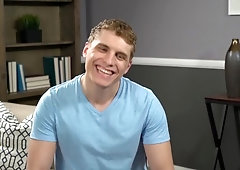 Curly hottie Kieran cums while kneeling