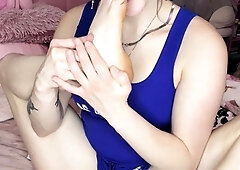 Sexy leggy brunette enjoys foot fetish