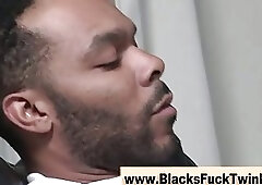 Ebony guy gets dick sucked by white guy on a couch