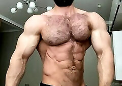 Hot muscle guy showing body