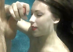 Kimber Lee sucks cock underwater