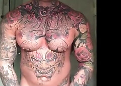 Tattooed Hunk Strokes His Big Cock Alone