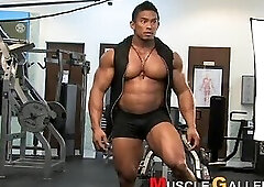 Stan Mcquay lifting weights, flexing, and posing + more