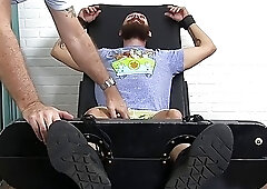 Bald and bearded stud restrained go have his feet tickled