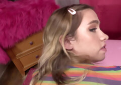 Blonde girl talks dirty while sucking and stroking a hard cock