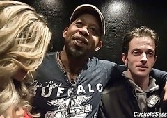 Marvelous auburn haired babe in the company of black men