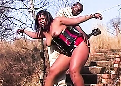 Curvy big tits African town slut spanked