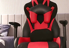 Blonde in sheer dress teases her big ass before masturbating in gaming chair