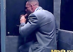 Classy hunk sucks gloryhole cock before threeway drilling