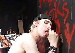 Young blond guy handles a gloryhole - Street Trade Studios