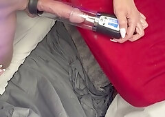 Gorgeous shemale pleasuring her submissive sissy dick with a pumping toy