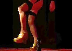 Hungry sissy bitch stretches her rectal hole with a large ebony sex toy. High heels, shiny nylon nylons.