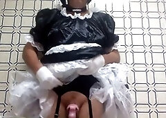 Sissy gets humiliated in a uniform while swallowing cum