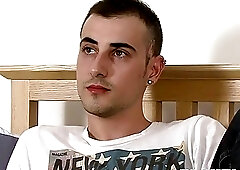 Dashing young gay takes his big dick out to masturbate