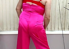 Hooded TV superslut in satin jumpsuit.