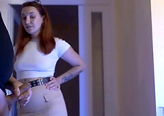 Seductive redhead gives blowjob at the door, swallows man juice. Vocalizes loud. Up close