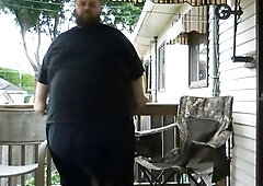 Obese dudes sitting outside pleased