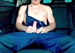 worker jerks huge dick in car