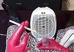 Smokin' crossdresser jerking off infront of the heater in hawt boots. Getting my weenie priceless and sexy cumming all over myself.feeling the ha