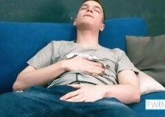 Slender dark-haired twink gets off while playing with a sex toy