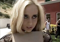 Hot golden-haired in ebony fishnet top gives head and gets banged by 3 lads