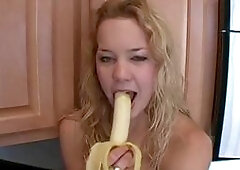 Naughty solo teen slut chewing on a banana