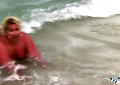 Busty and chubby Monica flashing at the beach