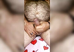 Fat shaggy bear strokes him and lets off thick load