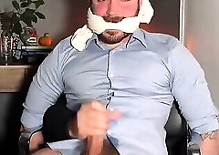 Tied up while getting jerked and spraying a huge load