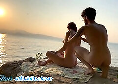 Applying sunscreen to a stranger on a nude beach