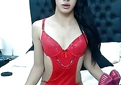 Exotic shemale vigorously strokes her hard rod on live webcams