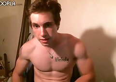 Muscular hottie Eric Morning jerking off furiously in a gay porn vid