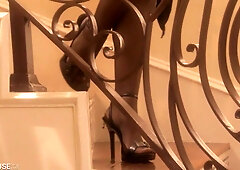 Curvy brunette Ann Marie Rios seduces in the bathroom with candles and high heels