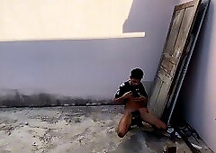 Skinny guy with a big dick jerking off in the street